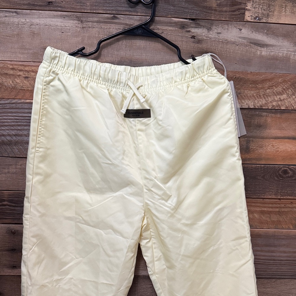 Essentials Light yellow Satin joggers